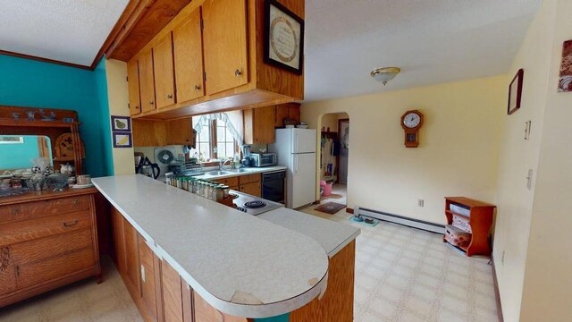 1862 Hooksett Rd, Hooksett, NH 03106 - kitchen featuring a baseboard radiator, freestanding refrigerator, light countertops, light floors, and a sink