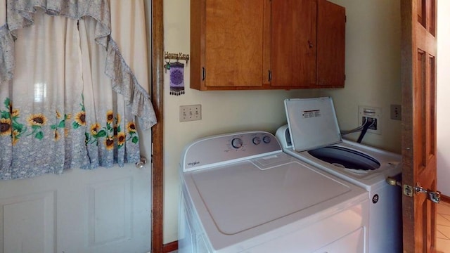 1862 Hooksett Rd, Hooksett, NH 03106 - washroom featuring washing machine and dryer and cabinet space