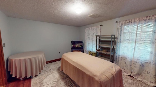 1862 Hooksett Rd, Hooksett, NH 03106 - bedroom featuring a textured ceiling