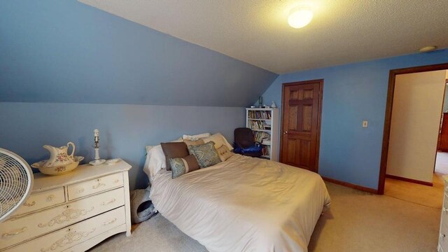 1862 Hooksett Rd, Hooksett, NH 03106 - bedroom with light carpet, vaulted ceiling, and baseboards