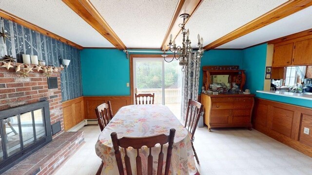 1862 Hooksett Rd, Hooksett, NH 03106 - dining space featuring beamed ceiling, light floors, a chandelier, wainscoting, and a textured ceiling
