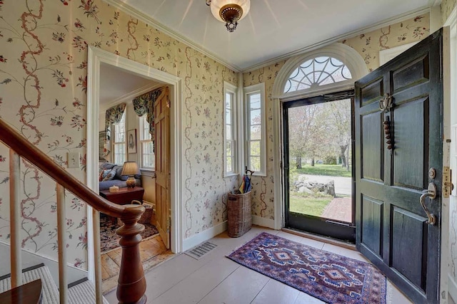 520 Washington Rd, Rye, NH 03870 - entrance foyer featuring wallpapered walls, crown molding, light tile patterned floors, and baseboards