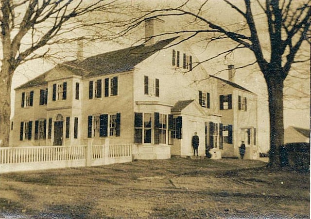 520 Washington Rd, Rye, NH 03870 - rear view of house featuring a chimney