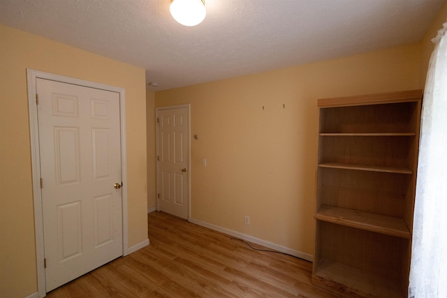 11 Henry Dr, Effingham, NH 03882 - unfurnished bedroom featuring light wood-style flooring and baseboards