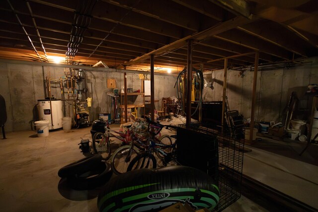 11 Henry Dr, Effingham, NH 03882 - unfinished below grade area featuring water heater