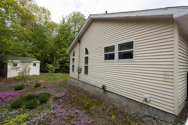 11 Henry Dr, Effingham, NH 03882 - view of side of home with an outdoor structure