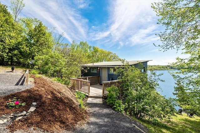 235 Pleasant View Dr, North Hero, VT 05474 - view of front of property with a deck with water view