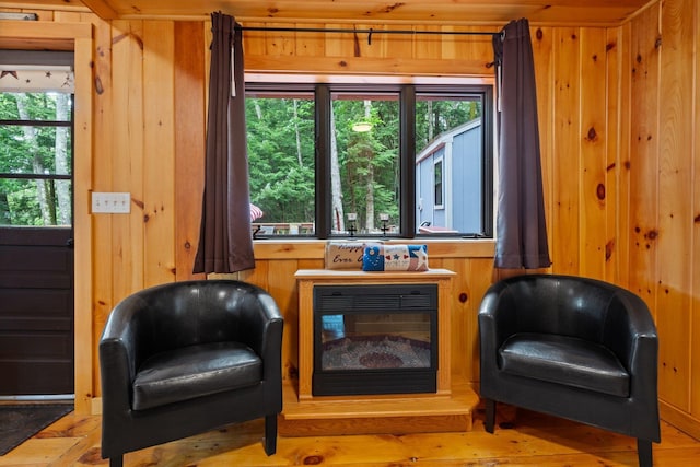 239 NE Pond Rd, Milton, NH 03851 - living area featuring wood walls and hardwood / wood-style floors