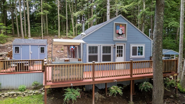 239 NE Pond Rd, Milton, NH 03851 - back of house featuring a deck and an outdoor structure