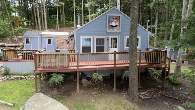 239 NE Pond Rd, Milton, NH 03851 - rear view of house featuring a deck
