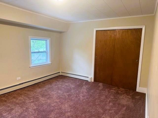 54 E Center St, Rutland City, VT 05701 - empty room featuring baseboard heating, crown molding, and carpet