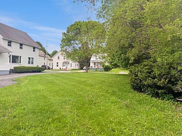 54 E Center St, Rutland City, VT 05701 - view of grassy yard featuring a residential view