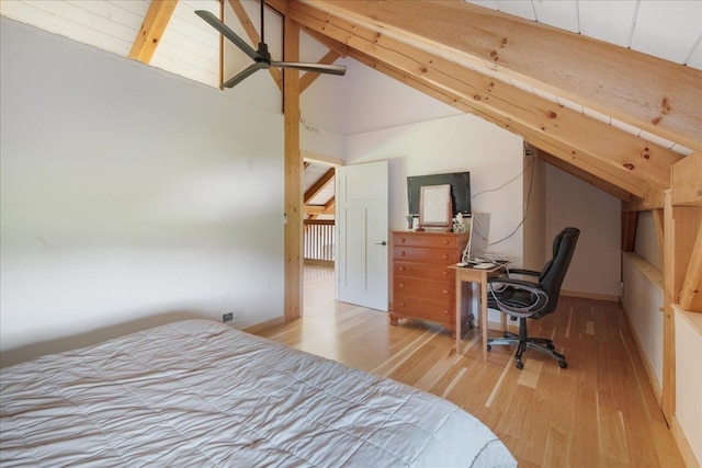 64 Atkins Farm Rd, Ferrisburgh, VT 05456 - bedroom with wood finished floors, high vaulted ceiling, a desk, and beamed ceiling