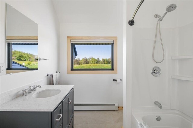 64 Atkins Farm Rd, Ferrisburgh, VT 05456 - bathroom with a baseboard heating unit, vanity, bathtub / shower combination, and marble finish flooring