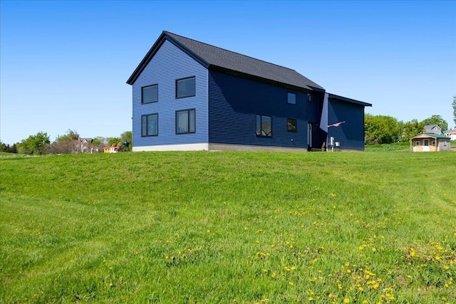 64 Atkins Farm Rd, Ferrisburgh, VT 05456 - view of home's exterior with a yard