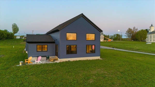64 Atkins Farm Rd, Ferrisburgh, VT 05456 - back of house with a lawn