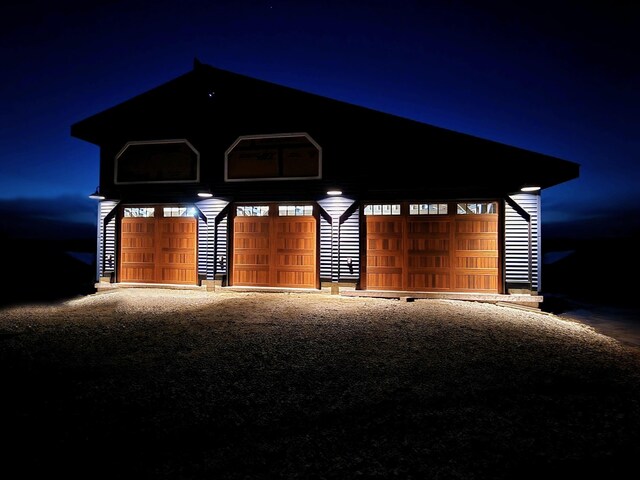 64 Atkins Farm Rd, Ferrisburgh, VT 05456 - view of garage at night