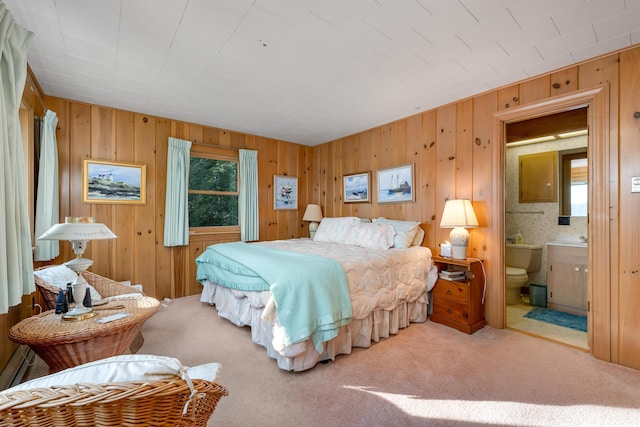 74 Keewaydin Rd, Wolfeboro, NH 03894 - bedroom with multiple windows, carpet floors, wooden walls, and ensuite bathroom