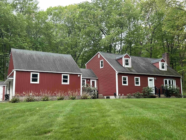 7 Juniper Ridge Rd, Exeter, NH 03833 - cape cod home with a front yard, a chimney, and roof with shingles