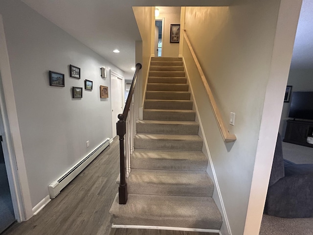 7 Juniper Ridge Rd, Exeter, NH 03833 - staircase with a baseboard heating unit, wood finished floors, baseboards, and recessed lighting