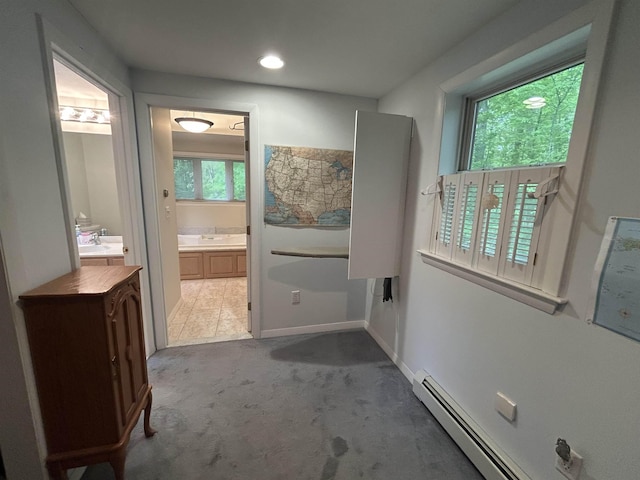 7 Juniper Ridge Rd, Exeter, NH 03833 - bathroom with a baseboard heating unit, vanity, and recessed lighting