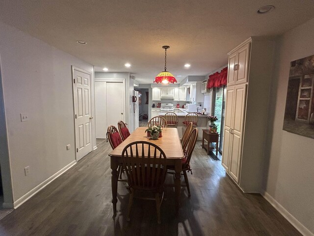 7 Juniper Ridge Rd, Exeter, NH 03833 - dining area with dark wood-style flooring, baseboards, and recessed lighting