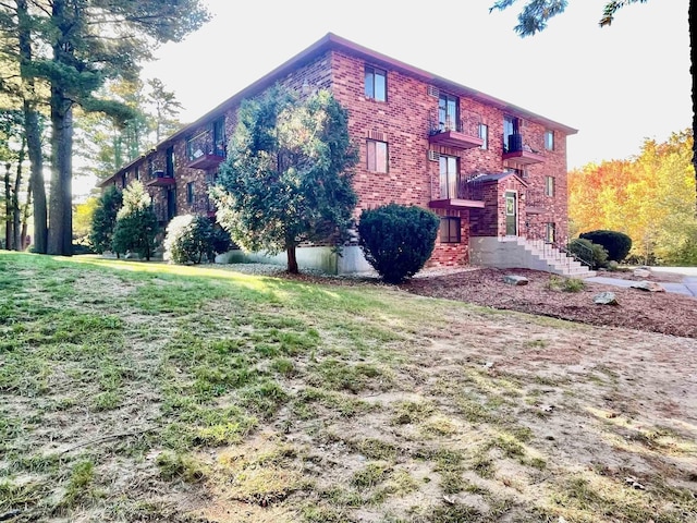 1265 Bodwell Rd Unit 13, Manchester, NH 03109 - view of side of property with brick siding