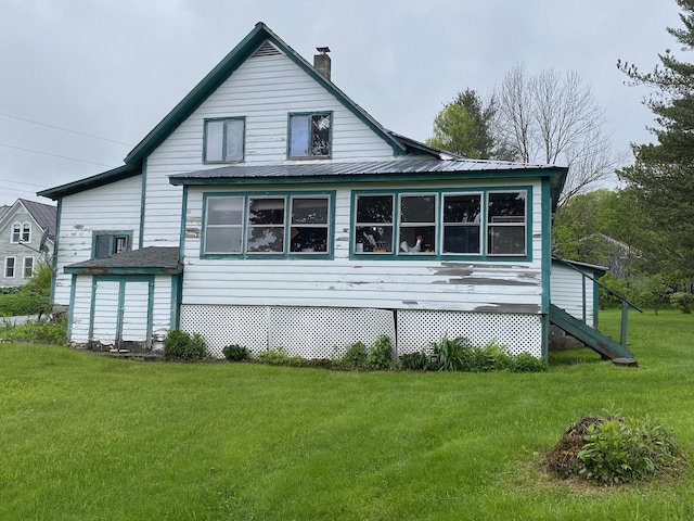 178 Parsons Rd, Wilmington, VT 05363 - view of side of property featuring a chimney and a yard