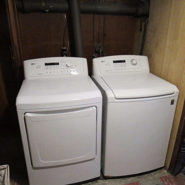 70 Forest Park Dr, Nashua, NH 03060 - washroom with independent washer and dryer and wood walls