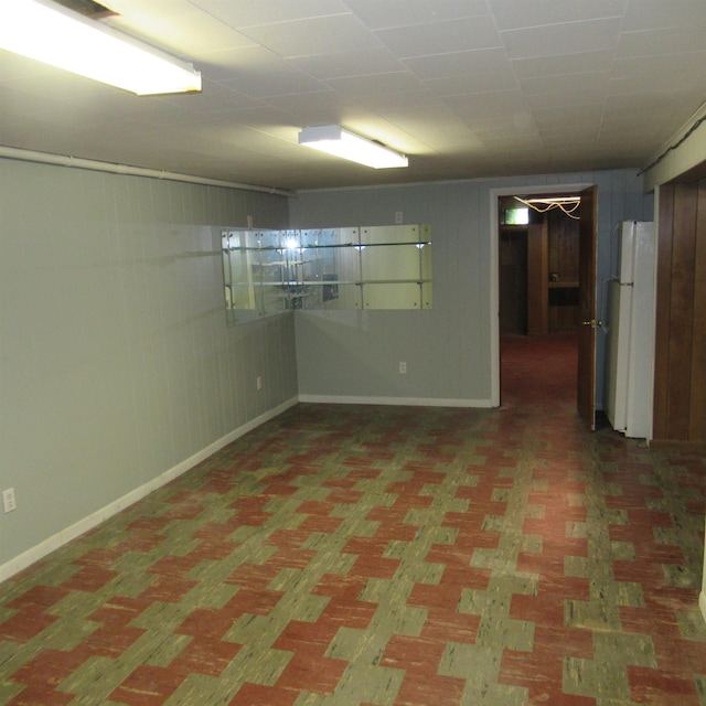 70 Forest Park Dr, Nashua, NH 03060 - finished below grade area featuring freestanding refrigerator and baseboards