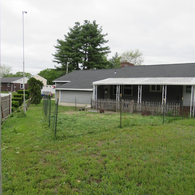 70 Forest Park Dr, Nashua, NH 03060 - back of property with a chimney and a shingled roof