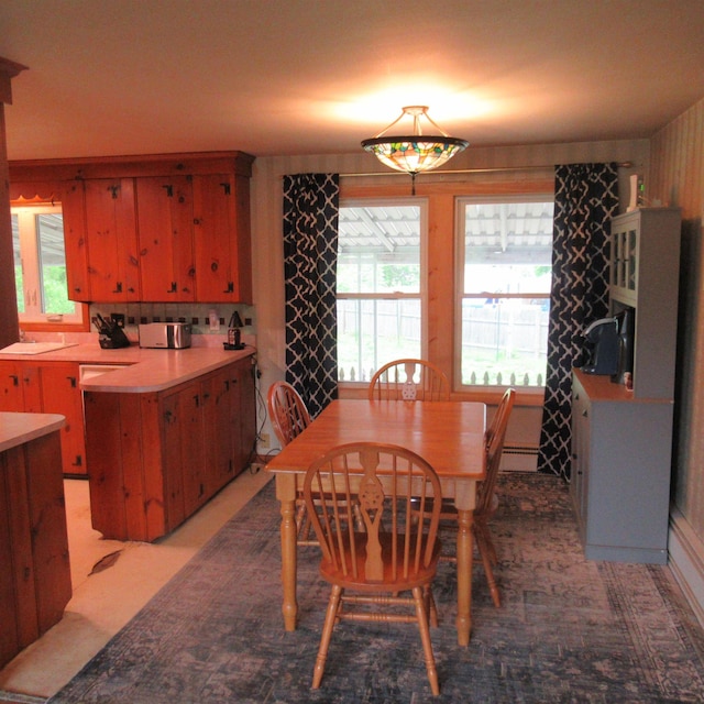 70 Forest Park Dr, Nashua, NH 03060 - dining area featuring a baseboard radiator