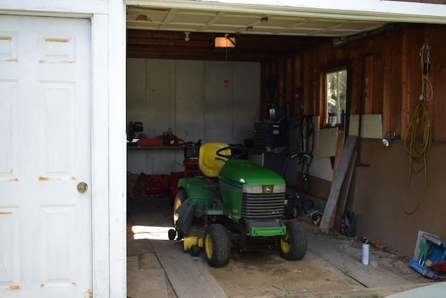 18 Bridge St, Lancaster, NH 03584 - garage featuring a garage door opener
