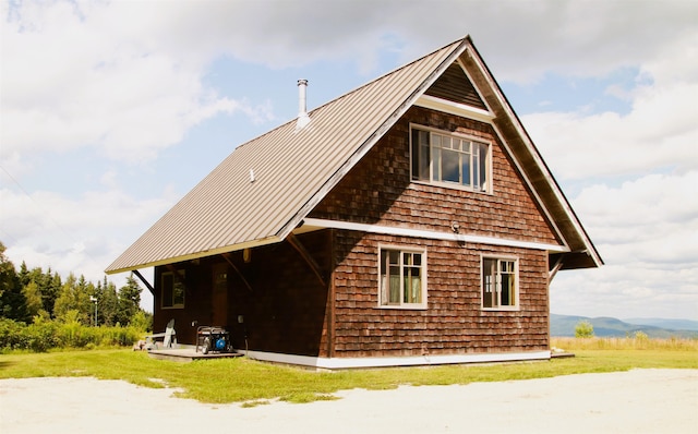 360 Coles Rd, Westmore, VT 05860 - view of property exterior featuring a standing seam roof and metal roof