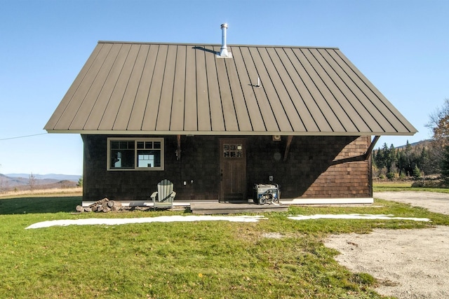 360 Coles Rd, Westmore, VT 05860 - view of front of property with a standing seam roof, a front lawn, and metal roof