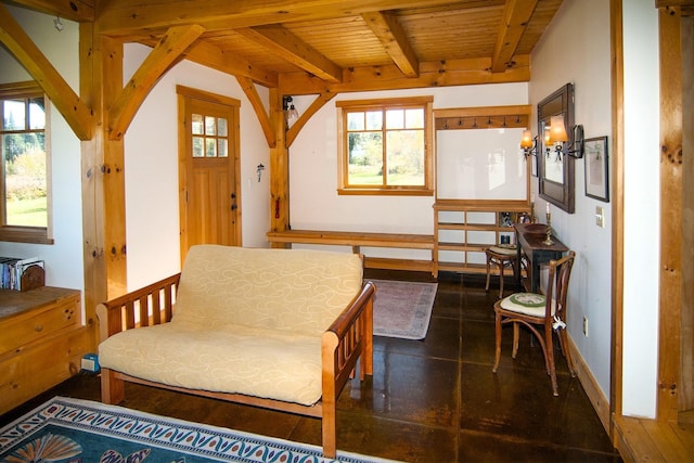 360 Coles Rd, Westmore, VT 05860 - living area featuring wooden ceiling with exposed beams and baseboards