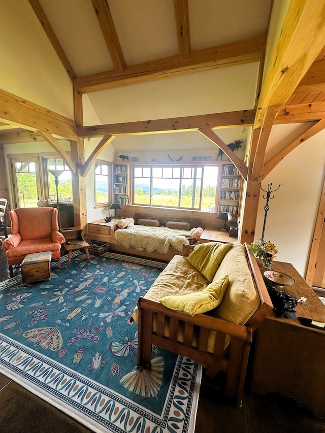 360 Coles Rd, Westmore, VT 05860 - living room with beamed ceiling, healthy amount of natural light, and high vaulted ceiling