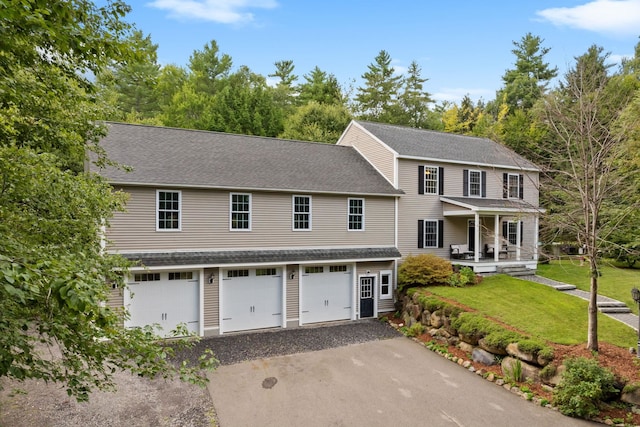 379 New Boston Rd, Francestown, NH 03043 - view of front of property with driveway, covered porch, an attached garage, a front lawn, and a shingled roof
