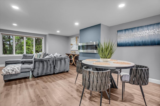 6 Swift Ln, Merrimack, NH 03054 - dining area with light wood-type flooring, baseboards, and recessed lighting
