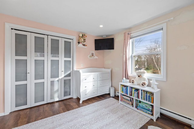 21 Regis Rd, Laconia, NH 03246 - bedroom with a baseboard heating unit, wood finished floors, recessed lighting, and baseboards