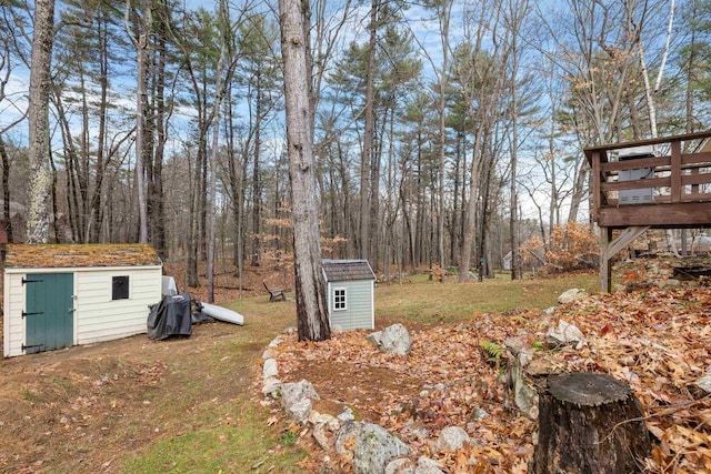 21 Regis Rd, Laconia, NH 03246 - view of green lawn featuring a wooden deck