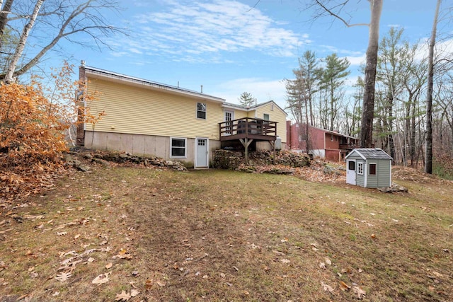 21 Regis Rd, Laconia, NH 03246 - view of side of home featuring a wooden deck and a yard
