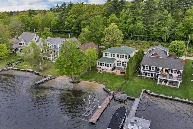 90 Paugus Park Rd, Laconia, NH 03246 - view from above of property with a heavily wooded area and a nearby body of water