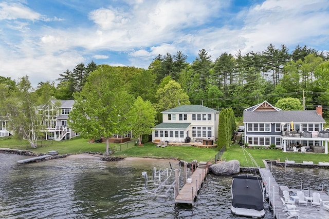 90 Paugus Park Rd, Laconia, NH 03246 - dock area with a lawn and a deck with water view