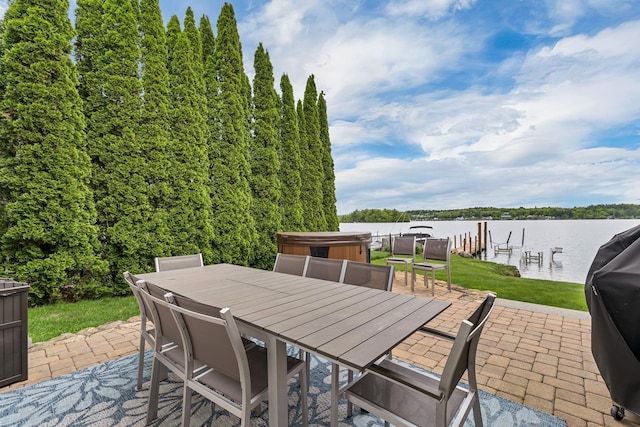 90 Paugus Park Rd, Laconia, NH 03246 - view of patio with outdoor dining space, a water view, a boat dock, and a hot tub