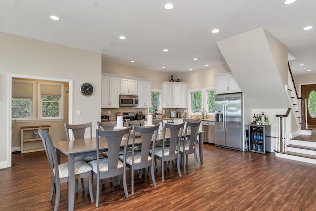 90 Paugus Park Rd, Laconia, NH 03246 - dining space featuring dark wood-type flooring, stairs, recessed lighting, and baseboards