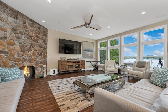 90 Paugus Park Rd, Laconia, NH 03246 - living area with wood finished floors, a ceiling fan, recessed lighting, baseboards, and a stone fireplace