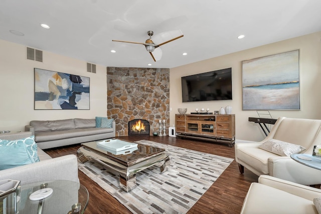 90 Paugus Park Rd, Laconia, NH 03246 - living area with wood finished floors, recessed lighting, a ceiling fan, and a stone fireplace