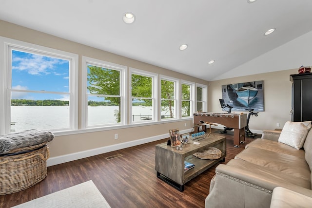 90 Paugus Park Rd, Laconia, NH 03246 - living area featuring plenty of natural light, baseboards, dark wood finished floors, recessed lighting, and vaulted ceiling