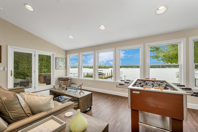 90 Paugus Park Rd, Laconia, NH 03246 - living room with vaulted ceiling, recessed lighting, baseboards, dark wood-style flooring, and a water view